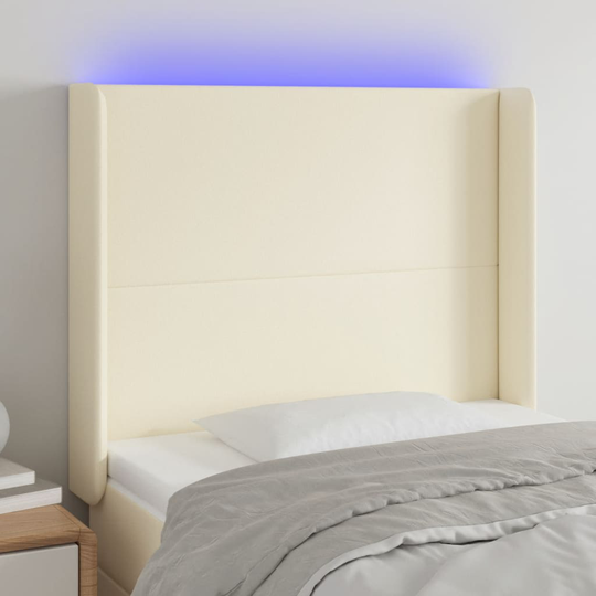 vidaXL Huvudgavel LED gräddvit 83x16x118/128 cm konstläder