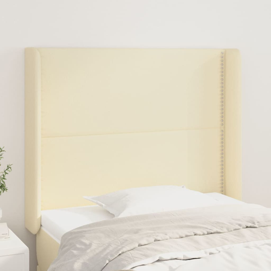 vidaXL Huvudgavel med kanter gräddvit 103x16x118/128 cm konstläder