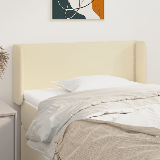 vidaXL Huvudgavel med kanter gräddvit 103x16x78/88 cm konstläder