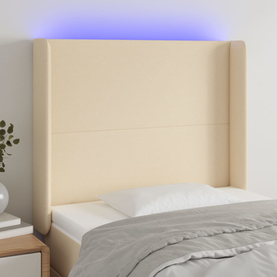 vidaXL Huvudgavel LED gräddvit 83x16x118/128 cm tyg