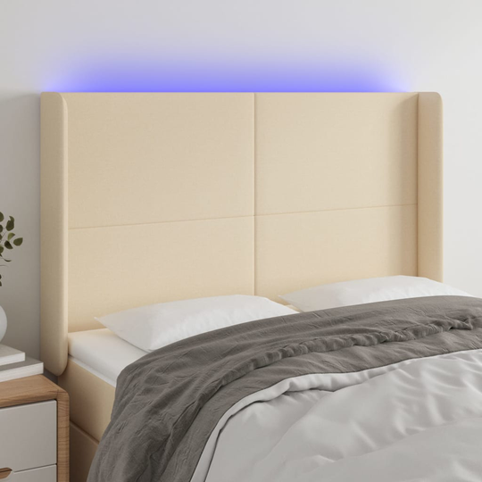 vidaXL Huvudgavel LED gräddvit 147x16x118/128 cm tyg