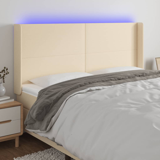 vidaXL Huvudgavel LED gräddvit 163x16x118/128 cm tyg