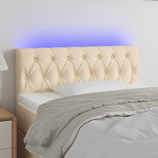 vidaXL Huvudgavel LED gräddvit 100 x 7 x 78/88 cm tyg