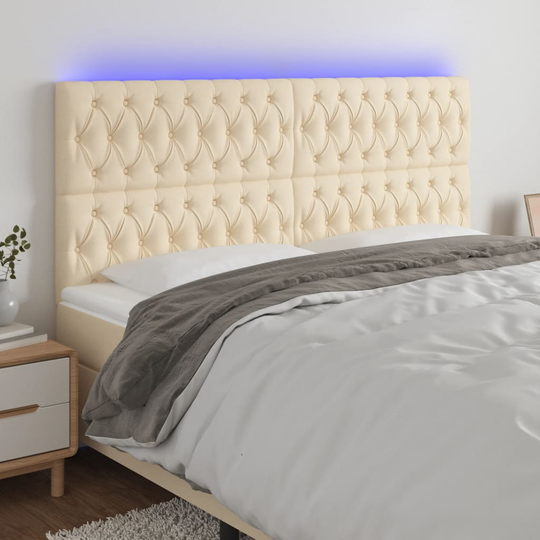 vidaXL Huvudgavel LED gräddvit 180x7x118/128 cm tyg